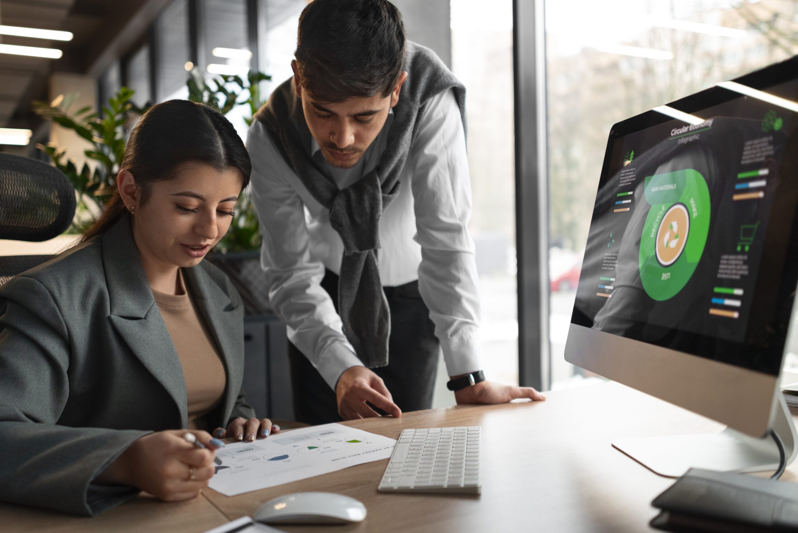 Financial partner reviewing strategic planning data with a business owner