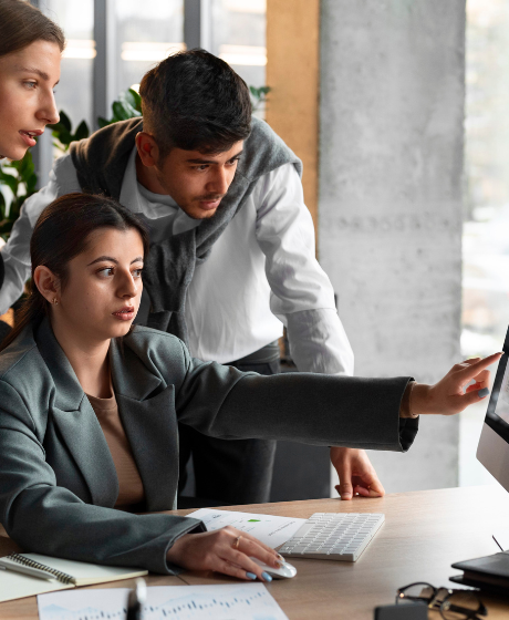 Financial partner team reviewing business insights on screen